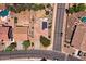 Overhead view of a single-Gathering home with solar panels and a well-maintained yard at 44182 W Juniper Ave, Maricopa, AZ 85138