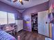 Comfortable bedroom with ceiling fan, closet, and window with blinds at 44182 W Juniper Ave, Maricopa, AZ 85138