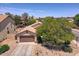 Charming single-Gathering home featuring a two-car garage and desert landscaping at 44182 W Juniper Ave, Maricopa, AZ 85138