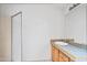 Bathroom with glass door shower, tile walls, and vanity at 49039 N 24Th Ave, New River, AZ 85087