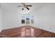 Bright bedroom with vinyl floors, scenic views, and bay windows at 49039 N 24Th Ave, New River, AZ 85087