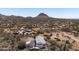 Aerial view of home showing desert environment with mountain views and community at 49039 N 24Th Ave, New River, AZ 85087