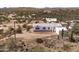 Exterior of home in desert environment, with beautiful vista and natural landscaping at 49039 N 24Th Ave, New River, AZ 85087
