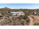 This well-maintained home offers desert views and easy access to hiking trails at 49039 N 24Th Ave, New River, AZ 85087