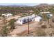 Home exterior in desert area with views of mountains, desert foliage, and community at 49039 N 24Th Ave, New River, AZ 85087
