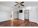 Spacious main bedroom with a TV, closet, and private bathroom at 49039 N 24Th Ave, New River, AZ 85087