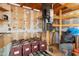 Utility room featuring batteries, shelving, and other essentials for off-grid living at 49039 N 24Th Ave, New River, AZ 85087