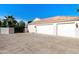 Spacious three-car garage with ample driveway space, providing convenient parking and storage solutions at 541 E Spur Ave, Gilbert, AZ 85296
