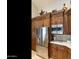 Stylish kitchen featuring stainless steel appliances and rich wood cabinetry at 541 E Spur Ave, Gilbert, AZ 85296