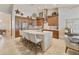 Well-equipped kitchen with abundant cabinetry, seating, and an island for entertaining at 541 E Spur Ave, Gilbert, AZ 85296