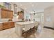 Bright, open kitchen featuring a large island with seating and modern fixtures at 541 E Spur Ave, Gilbert, AZ 85296