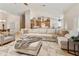 Spacious living room with an open floor plan, seamlessly connected to the kitchen at 541 E Spur Ave, Gilbert, AZ 85296