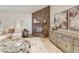 Inviting living room featuring a stone fireplace and comfortable seating arrangement at 541 E Spur Ave, Gilbert, AZ 85296