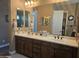 Bathroom features double sinks, a large vanity with a mirror, and lots of storage space at 5637 E Lonesome Trl, Cave Creek, AZ 85331