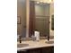 Bathroom vanity features double sinks, beige granite countertop, and wood cabinets at 5637 E Lonesome Trl, Cave Creek, AZ 85331