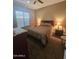 Cozy bedroom with a comfortable bed, side tables with lamps, and a serene ambiance at 5637 E Lonesome Trl, Cave Creek, AZ 85331