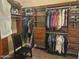 Walk-in closet with custom shelves, hanging rods, drawers, and shoe racks at 5637 E Lonesome Trl, Cave Creek, AZ 85331