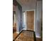 Entryway of home with hardwood flooring and wood door at 5637 E Lonesome Trl, Cave Creek, AZ 85331