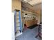 This garage is well-equipped with storage, cabinets, shelving, and a pegboard for tools at 5637 E Lonesome Trl, Cave Creek, AZ 85331