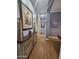 Hallway view, hardwood flooring, neutral paint, and decor at 5637 E Lonesome Trl, Cave Creek, AZ 85331