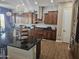 Stylish kitchen with granite countertops, mosaic backsplash, and ample cabinet space at 5637 E Lonesome Trl, Cave Creek, AZ 85331