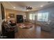 Spacious living room with hardwood floors, and large windows at 5637 E Lonesome Trl, Cave Creek, AZ 85331