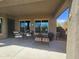 Relaxing covered patio with comfortable seating and a view of the outdoor space at 5637 E Lonesome Trl, Cave Creek, AZ 85331