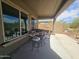 Inviting covered patio with dining set, ideal for outdoor entertaining at 5637 E Lonesome Trl, Cave Creek, AZ 85331