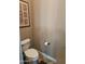 Toilet with decorative artwork above it at 5637 E Lonesome Trl, Cave Creek, AZ 85331