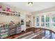 Sunlit bonus room with French doors and custom built-ins at 5818 N 3Rd Ave, Phoenix, AZ 85013