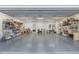 Clean garage with epoxy floor and metal storage racks at 5818 N 3Rd Ave, Phoenix, AZ 85013