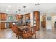 Spacious kitchen boasts ample cabinet space, granite counters, a central island, and modern appliances at 5818 N 3Rd Ave, Phoenix, AZ 85013
