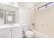 Bathroom with white vanity, mirror, and shower-tub combination at 8339 W Elm St, Phoenix, AZ 85037