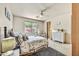 Comfortable bedroom featuring natural light from the window and cozy decor at 9780 E Gamble Ln, Scottsdale, AZ 85262