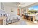 Inviting bedroom with a king bed, bright window and an adjacent work space at 9780 E Gamble Ln, Scottsdale, AZ 85262