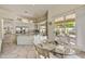 Bright dining area open to the kitchen with backyard views, perfect for casual meals at 9780 E Gamble Ln, Scottsdale, AZ 85262