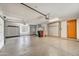 Spacious garage with built-in storage cabinets and epoxy flooring, great for organization at 9780 E Gamble Ln, Scottsdale, AZ 85262