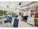 Spacious common area with comfortable seating, dining tables, and a modern design at 1 E Lexington Ave # 302, Phoenix, AZ 85012