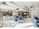Bright common area with dining tables, a lounge area, and contemporary décor at 1 E Lexington Ave # 302, Phoenix, AZ 85012
