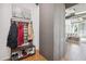 Entryway featuring a coat rack and decorative elements; flows into the living space at 1 E Lexington Ave # 302, Phoenix, AZ 85012