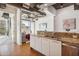 Kitchen featuring granite countertops and stainless steel appliances, with a view of the living area at 1 E Lexington Ave # 302, Phoenix, AZ 85012