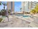 An inviting swimming pool with poolside lounge chairs offers a resort-style experience for residents at 1 E Lexington Ave # 302, Phoenix, AZ 85012