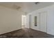 This carpeted bedroom features sliding-door closets and neutral colors at 1079 E Jasper Dr, Gilbert, AZ 85296