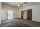 The bedroom has neutral paint, carpet, and easy bathroom access at 1079 E Jasper Dr, Gilbert, AZ 85296