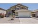 Charming two-story home with a tile roof and a two-car garage, set in a well-maintained neighborhood at 1079 E Jasper Dr, Gilbert, AZ 85296