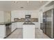 Modern kitchen featuring stainless steel appliances, granite countertops, and a practical kitchen island at 1079 E Jasper Dr, Gilbert, AZ 85296