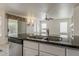 Kitchen featuring granite countertops, modern appliances, stainless steel dishwasher, and a double sink at 1079 E Jasper Dr, Gilbert, AZ 85296