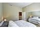 Bedroom featuring double bed, and mirrored closet at 11640 N Tatum Blvd # 1095, Phoenix, AZ 85028