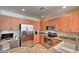 Well-lit kitchen featuring stainless steel appliances, granite countertops, and ample cabinet space at 11640 N Tatum Blvd # 1095, Phoenix, AZ 85028