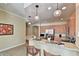 An open kitchen with stainless steel appliances and granite countertops with barstool seating at 11640 N Tatum Blvd # 1095, Phoenix, AZ 85028